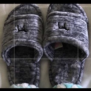 Two pairs of slippers, never worn. Brand new.